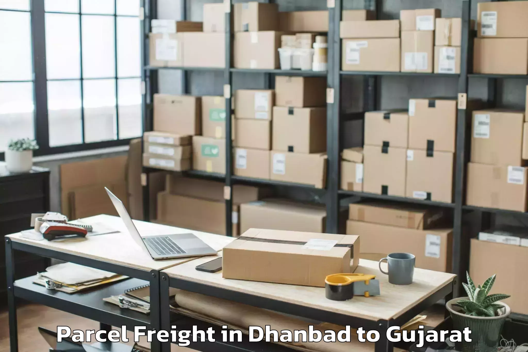 Book Dhanbad to Gusar Parcel Freight